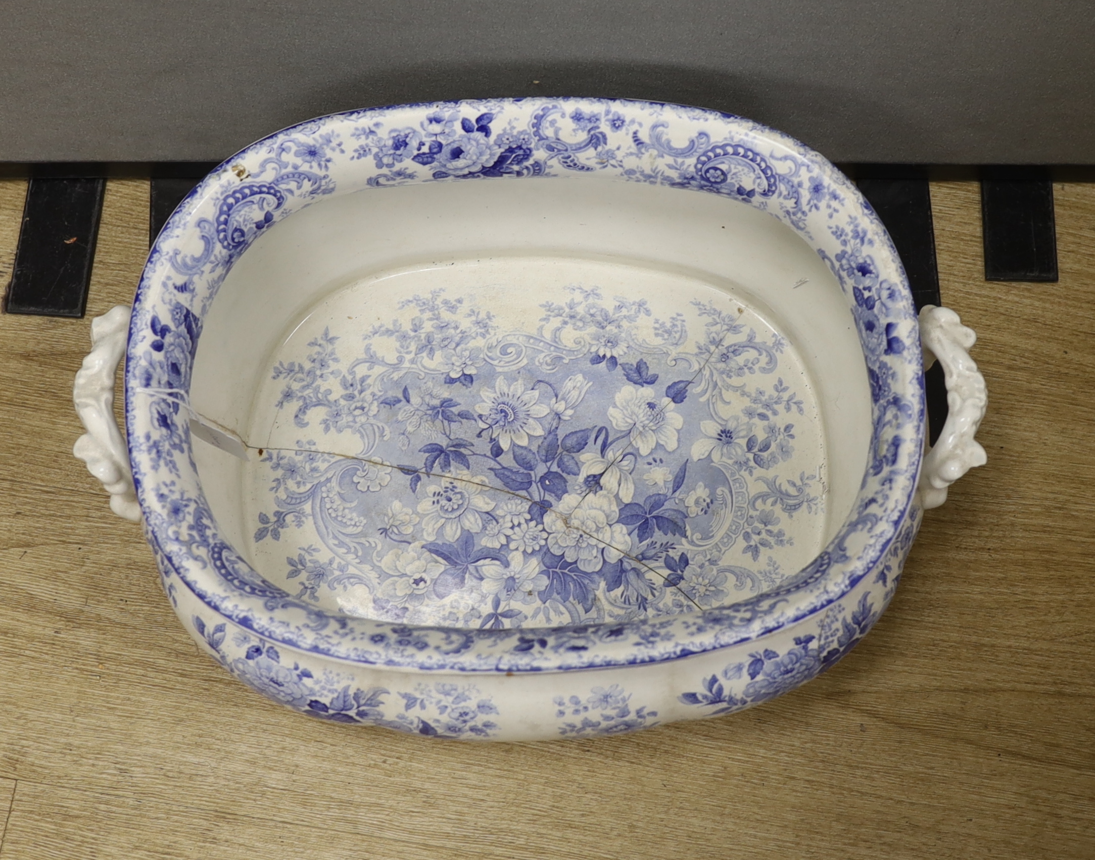 A large Minton blue printed footbath - repaired